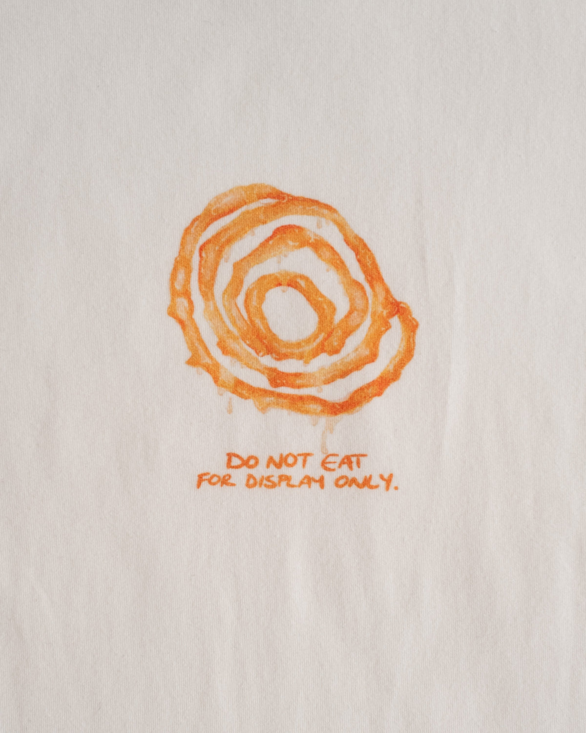 Close-up of the jalebi print and the line: do not eat, for display only #Color_Jalebi
