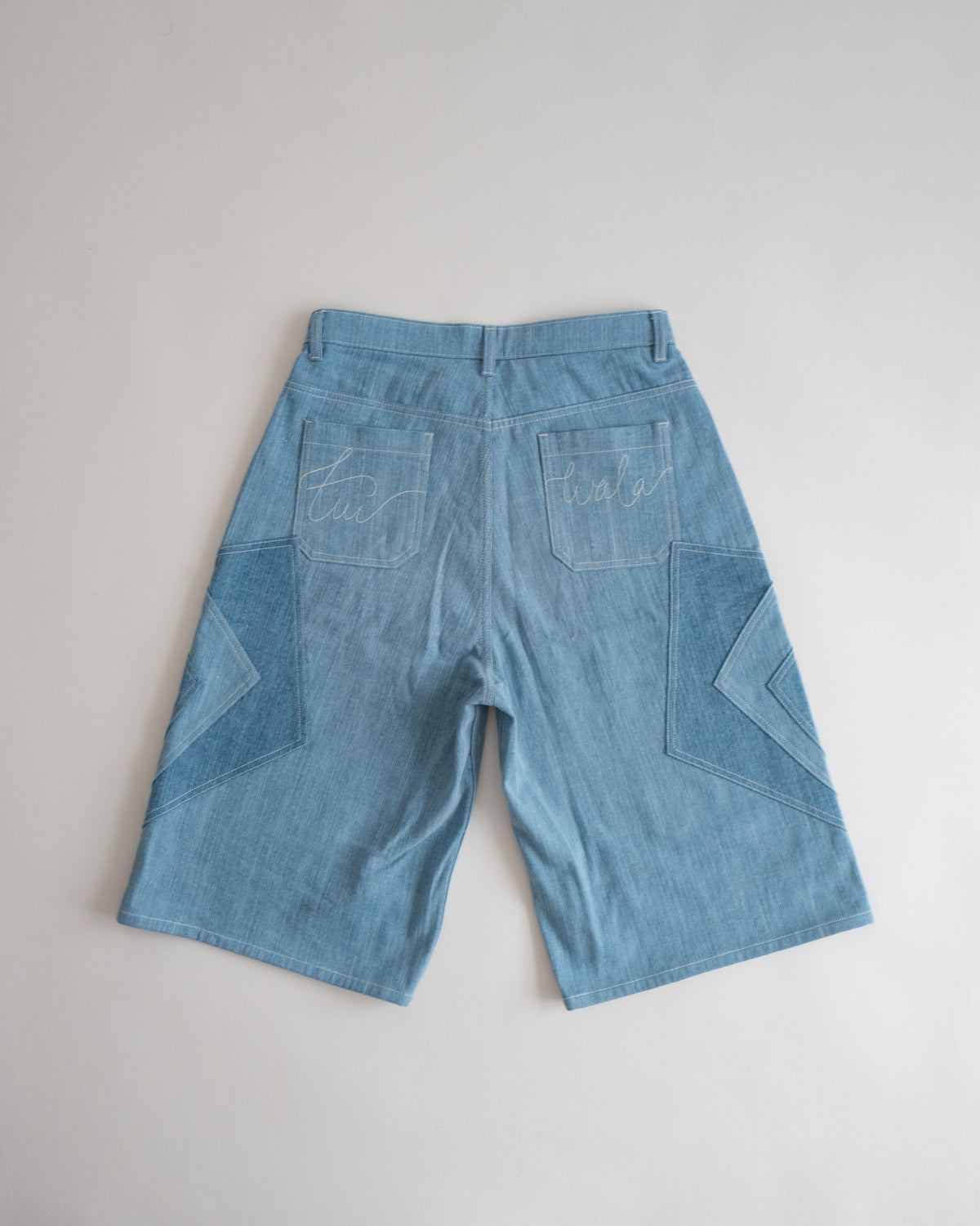 Khadi Katli Jorts, flat lay from the back, embroidered back pockets