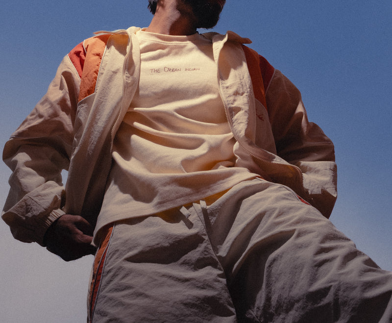 Low angle of the Saffron Orange Sweets Track Set against a blue sky