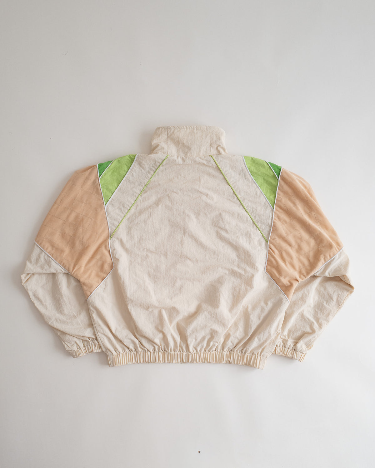 Sweets Track Jacket in Pista Green, flat lay from the back #Color_Pista Green