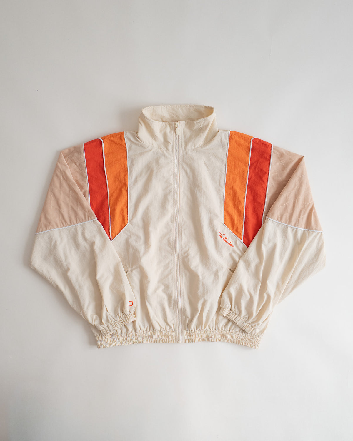 Sweets Track Jacket in Saffron Orange, flat lay from the front #Color_Saffron Orange